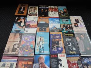 lot 235 image: VHS tapes- the cathedrals, Al Pacino, Titanic, The unforgettables, holy ground and many