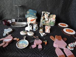 lot 252 image: Misc lot- wooden handcarved bears and bunnies, Victorias ceramics seattle worl fair plate hat holder, Angel Gorden music stand, candle holders and more