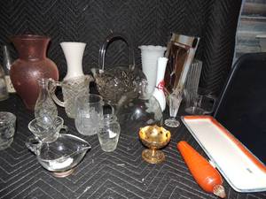 lot 261 image: 2 flower vases and 1 milk glass vase, various glass candy dishes, ceramic orange trim serving tray and glass basket with handlel