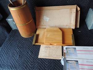 lot 273 image: Knife rack, cookbook rack NIB,  2 pasta racks NIB butter churn