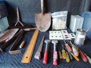 lot 274 image: Grey tub of misc. tools- Light covers for walls plug, t- measure, hammers, screw drivers and much more
