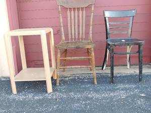 lot 290 image: 2 kitchen chairs- 1 brown with wicker seat and back and one  black wood seat and back