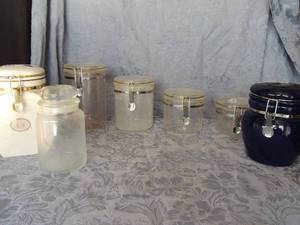 lot 293 image: Set of 4 plastic canisters with lids , 1 blue canister, 1 europe coffee nouse canister