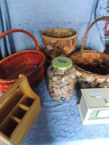 lot 312 image: 3 wicker baskets, Gordon box pickle jar full of corks and wooden carrier with handle