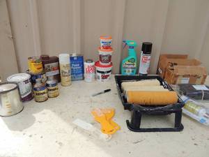 lot 337 image: 2 paint  pans, 4 paint rollars, energy smart bug light, 8 oz. wood filler, DAP patching plaste,  Lok cease 11lbs., paint thinner, can of glassstone tile sealer, wood sealer ester 100 x 2 primer sealer Harness assembly x 2 NIB   3 paint scrappersl