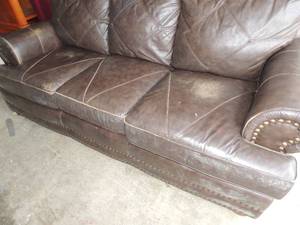 lot 362 image: brown beaded laether couch - has a few scratches