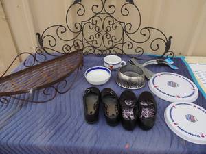 lot 370 image: Misc. lot of girls dress shoes, cast iron decor for outside wall kitchen spice rack 4 stove burner covers and 2 window squeegees.