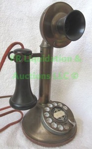 lot 1 image: Antique candlestick telephone with original cloth cords, dial rotary still works