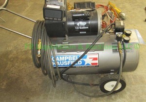 lot 5 image: Campbell Hausfeld 4HP air compressor plus hose. model WL604003AJ