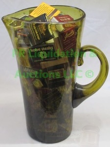 lot 17 image: Vintage hand blown glass pitcher full of vintage and modern matchbooks