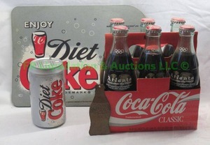 lot 26 image: Coca Cola collectibles including Diet Coke AMFM can radio, mouse pad and 1996 Olympics 6 pack