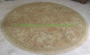 lot 32 image: Round area rug 64 wide