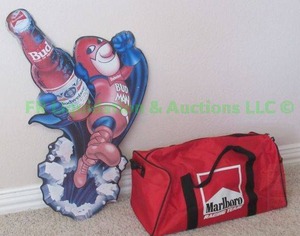 lot 114 image: Budweiser Bud man tin sign (31 tall) & Marlboro carry tote bag
