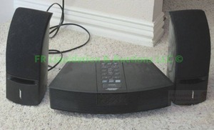 lot 122 image: Bose Wave radio model AWR1G1 and Bose 161 Speakers