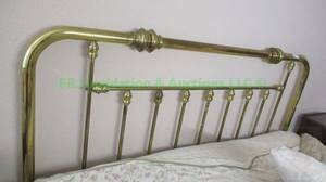 lot 131 image: Brass headboard and bed rails