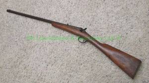 lot 153 image: Antique early 1900s Warnant Flobert belgium made octagon barrel .22 caliber single shot rifle. FOR COLLECTORS PURPOSES ONLY NOT SAFE TO FIRE.
