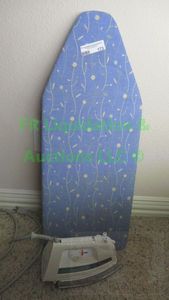 lot 173 image: Rowenta iron and ironing board