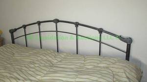 lot 178 image: Wrought iron style headboard and rails