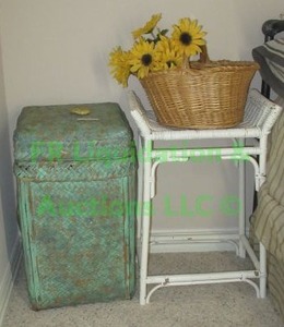 lot 179 image: Wicker accent stand, clothing hamper, basket and artificial flowers