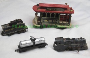 lot 183 image: Vintage wind up toy train engine (no wheels) with matching coal car and more
