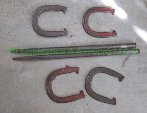 lot 226 image: Vintage Double Ringer dropped forged steel horse shoe game set