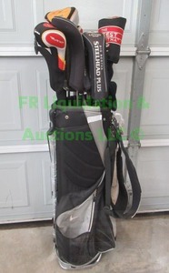 lot 229 image: Golf clubs and bag