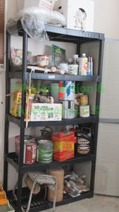 lot 233 image: Shelving unit and contents as shown
