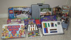 lot 266 image: Lego snowboard set, Guess who game and more games