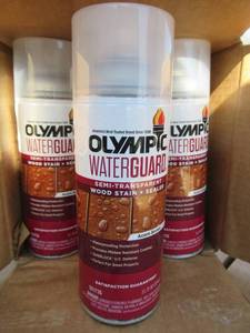lot 6 image: OLYMPIC WATERGUARD SEMI TRANSPARENT WOOD STAIN  SEALER IN ACORN BROWN 11.75 OZ CANS 6 CANS PER CASE