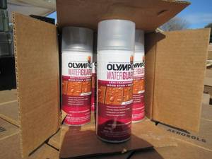 lot 8 image: OLYMPIC WATERGUARD SEMI TRANSPARENT WOOD STAIN  SEALER IN ACORN BROWN 11.75 OZ CANS 6 CANS PER CASE