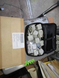 lot 98 image: INTERNATIONALUS MILITARY POWER ADAPTER KITS NSN# 6130015626678 IN CASE. POWER SUPPLY CONVERTERS