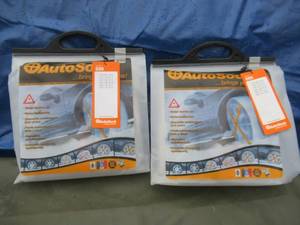 lot 150 image: AUTOSOCK TRACTION AND WHEEL COVER FOR ICE & SNOW. UNUSED IN UNOPENED PACKS. 2 PER BAG SEE PICTURES FOR TIRE SIZES