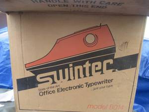 lot 183 image: MILITARY ISSUED SWINTEC TYPEWITER MODEL# 8014 UNUSED WITH ALL PAPERWORK NSN# 7430011166035