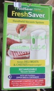 lot 124 image: Food Saver hand held vacuum food sealer in box