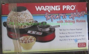 lot 129 image: Waring Pro popcorn maker with butter melting station in box