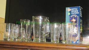 lot 98 image: Glass Beer serving glasses, pitcher & bottle opener