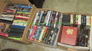 lot 99 image: DVD & VHS player and Assorted DVD, BluRay & VHS movies 3 boxes full