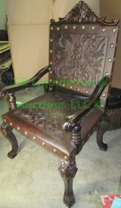 lot 73 image: Ornate Accent chair embossed leather seat & back on wood frame with oversized nail head trim, matches lot 72