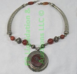 lot 275 image: Sterling silver and carved carnelian necklace