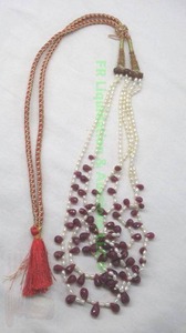 lot 276 image: Cultured pearl and ruby 3-strand necklace