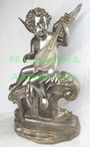 lot 221 image: Large solid nickel metal cherub figure w lyre, 20 tall. (seller states solid nickel not plated, please preview)
