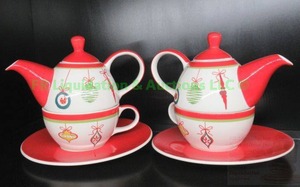 lot 182 image: HuesNBrews stacking Cup and saucer  teapot set