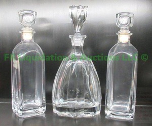 lot 197 image: Crystal decanter trio with stoppers