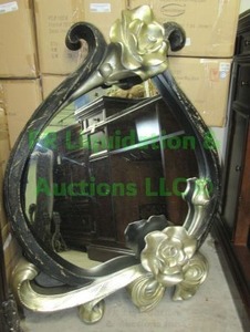 lot 214 image: Mirror in ornate flower form frame, 31 x 41
