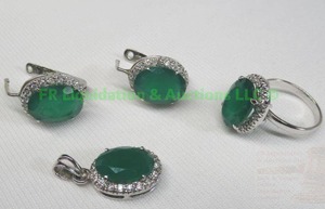 lot 297 image: Sterling silver green gemstone demi parure set