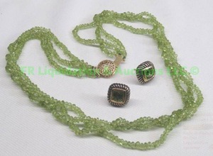 lot 300 image: 14K gold Peridot necklace and David Yurman earrings