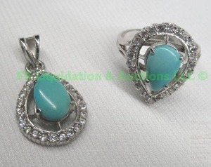 lot 301 image: Sterling silver turquoise pendant and ring set