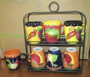 lot 201 image: Laurie Gates designer mug set with holder