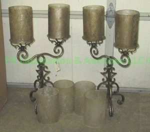 lot 141 image: Double wrought iron style candle holders, 27 tall