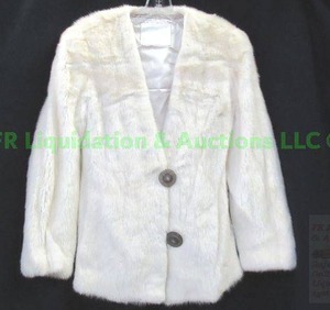 lot 280 image: Koslowes white mink 2-button jacket with exotic material buttons. Matches scarf in Lot 281.